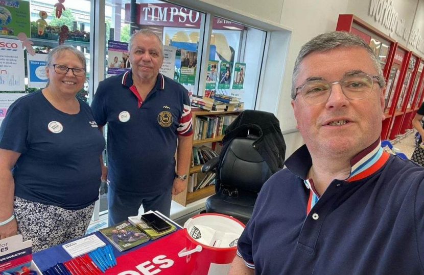 Sir Robert Buckland taking part in a Help for Heroes Collection at the Tesco Extra Store in Swindon