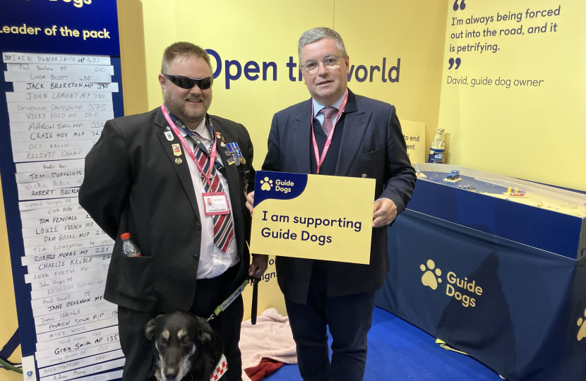 THe Rt Hon Sir Robert Buckland KBE KC MP hearing more about Guide Dogs UK's priorities