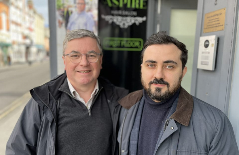 The Rt Hon SIr Robert Buckland Photographed with lawyer & former civil servant Illia Chernohorenko who is a Visiting Fellow at Bristol University