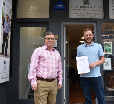 South Swindon MP Robert Buckland pictured with Swindon Mental Health Champion Samuel Robbins, Photo by Alfie Wolf