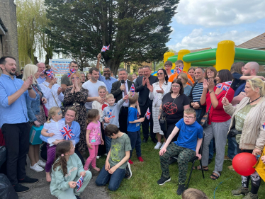 Sir Robert Buckland celebrating the Coronation with local residents in Park South