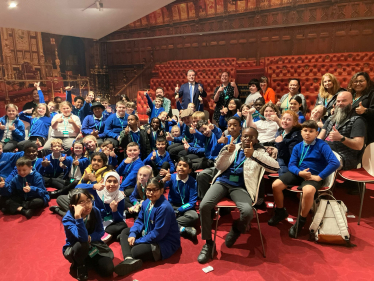 Sir Robert Buckland MP photographed with children and staff from Hazelwood Academy on their recent visit to Parliament