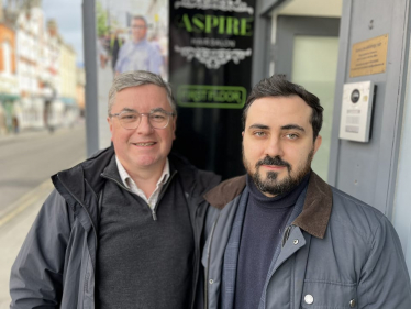 The Rt Hon SIr Robert Buckland Photographed with lawyer & former civil servant Illia Chernohorenko who is a Visiting Fellow at Bristol University