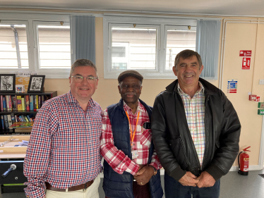 Sir Robert Buckland KBE KC with local resident Keith Duffus and PCC Philip Wilkinson