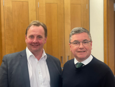 Sir Robert Buckland KBE KC MP pictured with Mountain Warehouse Founder and CEO Mark Neale